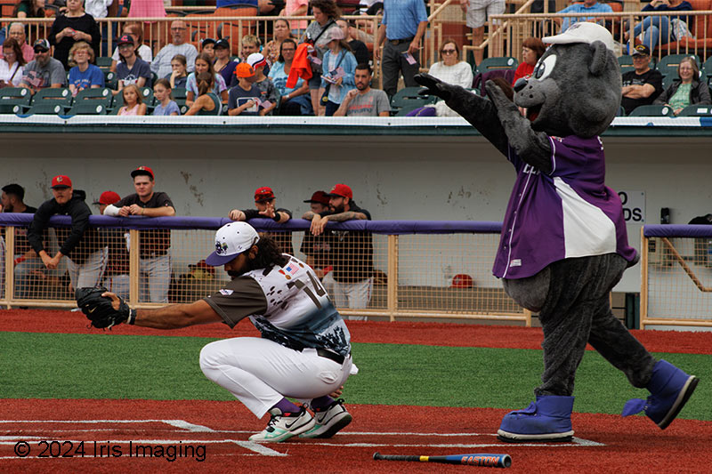 Catching a ball from a young fan